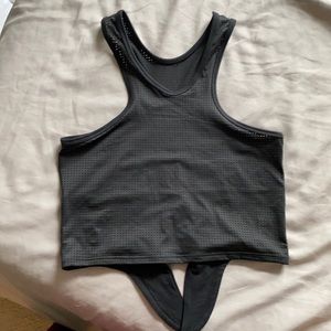 Bombshell perforated cropped tie back tank.